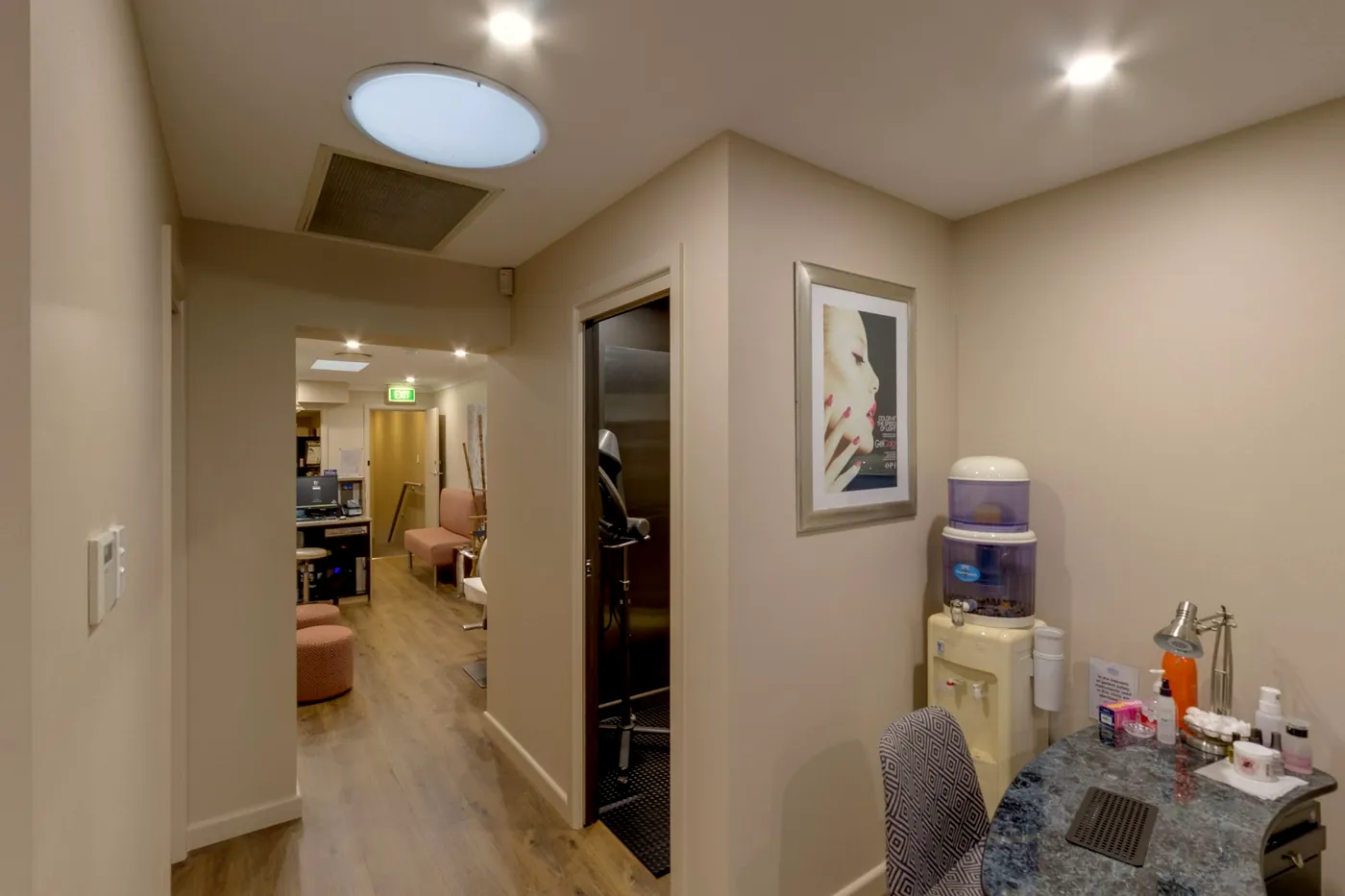 Christina's nail bar with the OPI polish stand and pedicure spa chairs